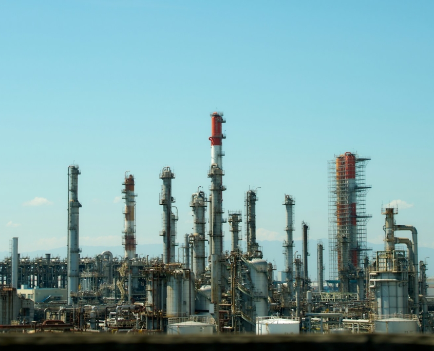 A factory with a lot of pipes and buildings